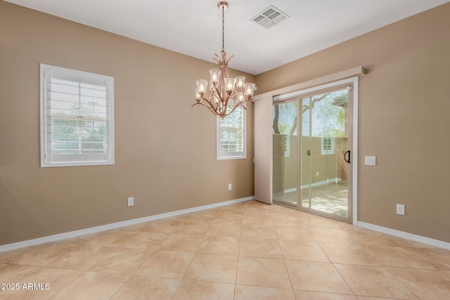 21136 N 36th Pl, Phoenix, AZ 85050 - unfurnished room featuring a chandelier and light tile patterned floors