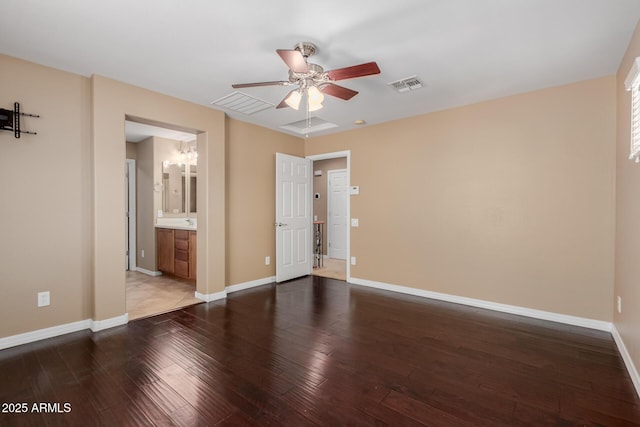 21136 N 36th Pl, Phoenix, AZ 85050 - unfurnished bedroom with hardwood / wood-style flooring, a ceiling fan, connected bathroom, and a chandelier