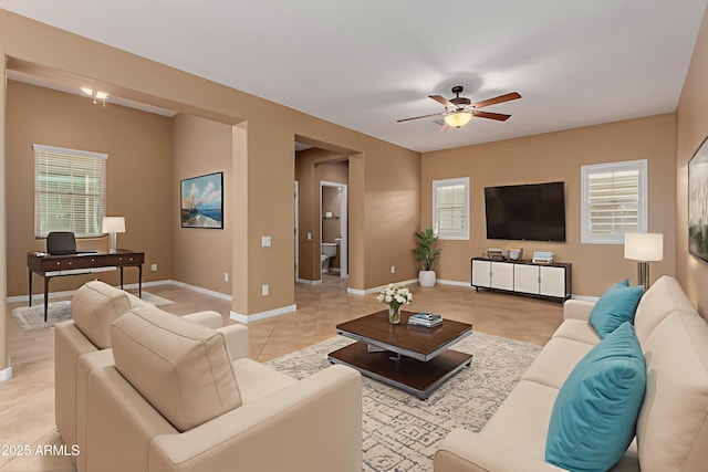 21136 N 36th Pl, Phoenix, AZ 85050 - living room with ceiling fan and light tile patterned floors