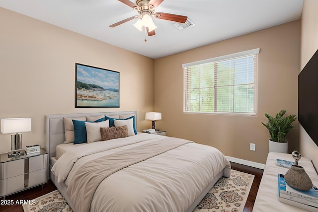 21136 N 36th Pl, Phoenix, AZ 85050 - bedroom with dark wood finished floors and ceiling fan