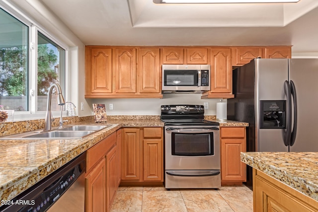 kitchen with appliances with stainless steel finishes and sink