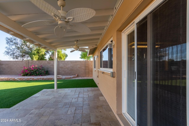 view of patio with a ceiling fan and a fenced backyard
