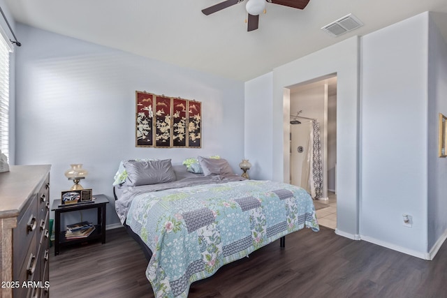 bedroom with dark wood-style floors, baseboards, visible vents, and a ceiling fan