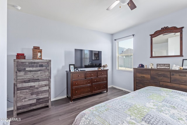 bedroom featuring dark wood-style floors, ceiling fan, and baseboards