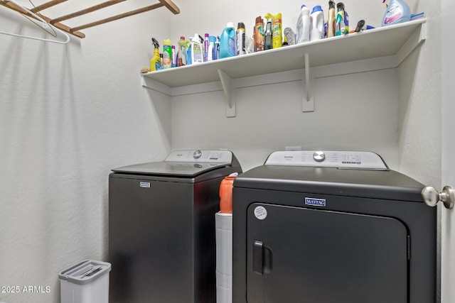 laundry room with washing machine and dryer and laundry area