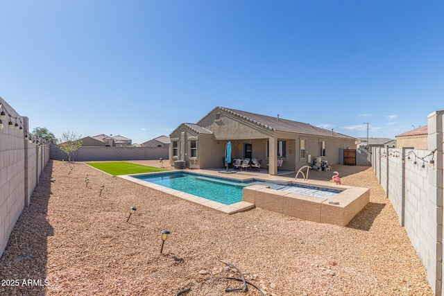 view of swimming pool featuring a patio, a fenced backyard, and a fenced in pool