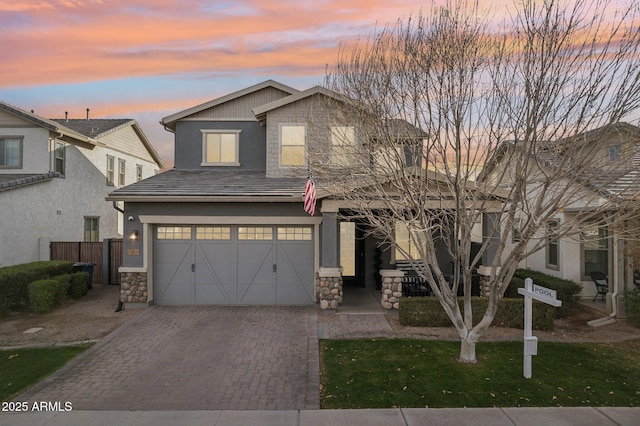 view of front of property with a garage