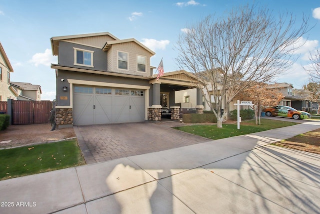 craftsman house with a garage