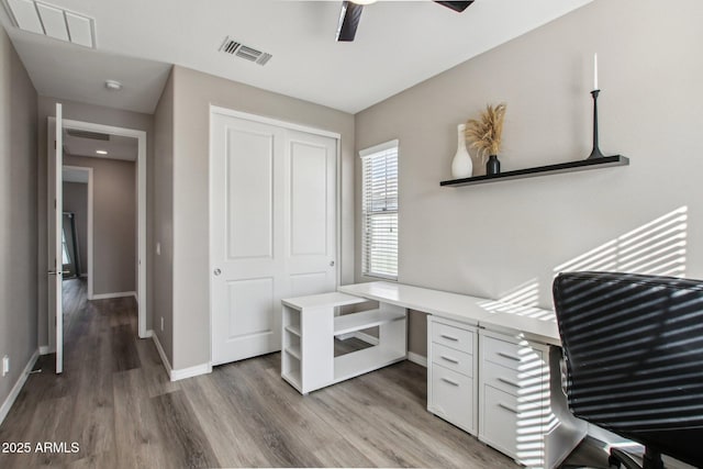 office area with hardwood / wood-style floors and ceiling fan