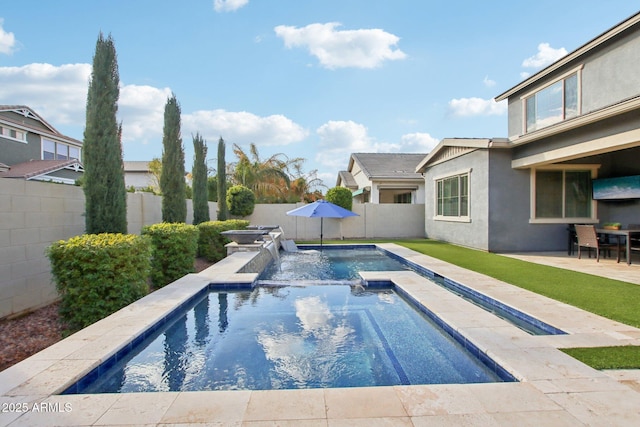 view of swimming pool featuring an in ground hot tub, pool water feature, and a patio