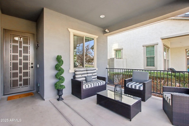 view of patio / terrace featuring outdoor lounge area and a balcony