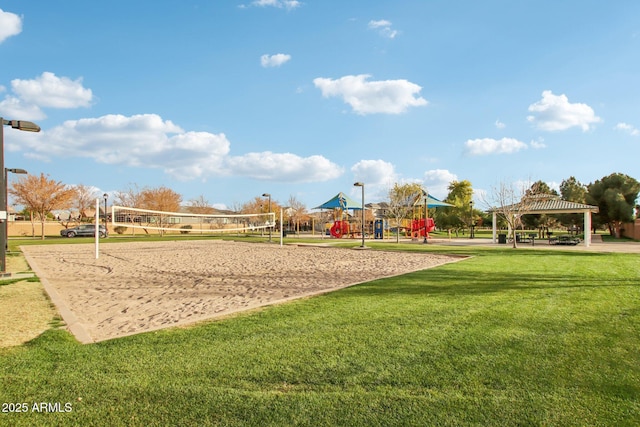 view of community featuring a gazebo, a yard, a playground, and volleyball court