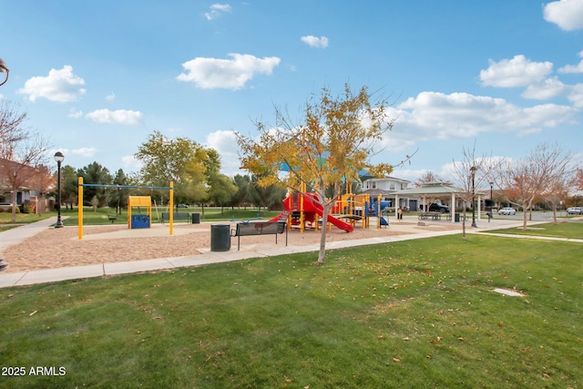 view of jungle gym featuring a lawn