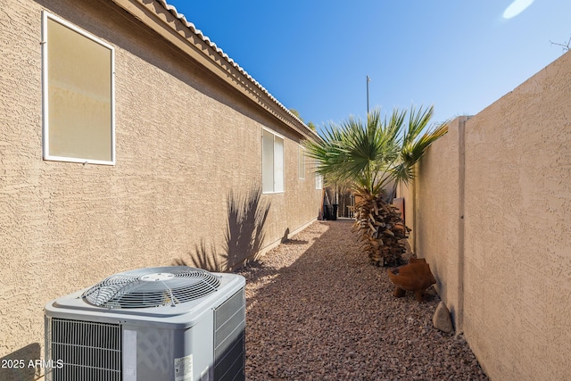 view of home's exterior with cooling unit