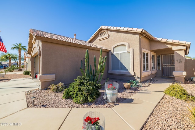 view of property exterior with a garage