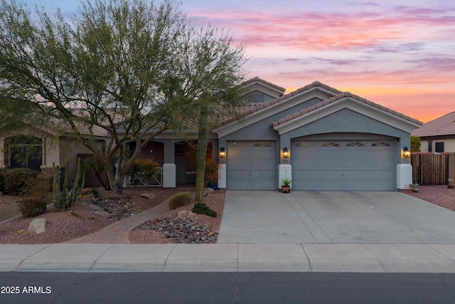 view of front of home with a garage