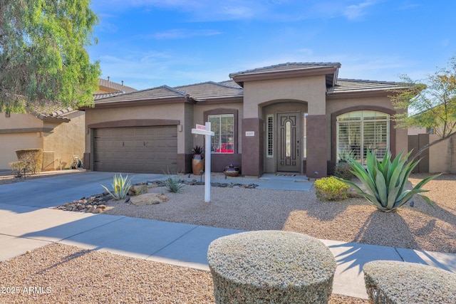 view of front of home with a garage