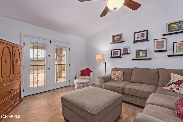 living room with french doors, vaulted ceiling, ceiling fan, and light tile patterned flooring