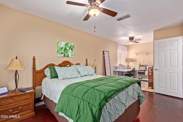 bedroom featuring dark hardwood / wood-style floors and ceiling fan