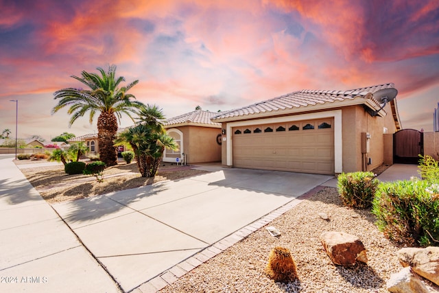 view of front of home with a garage