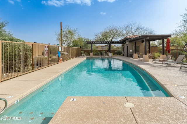 pool featuring fence, a pergola, and a patio