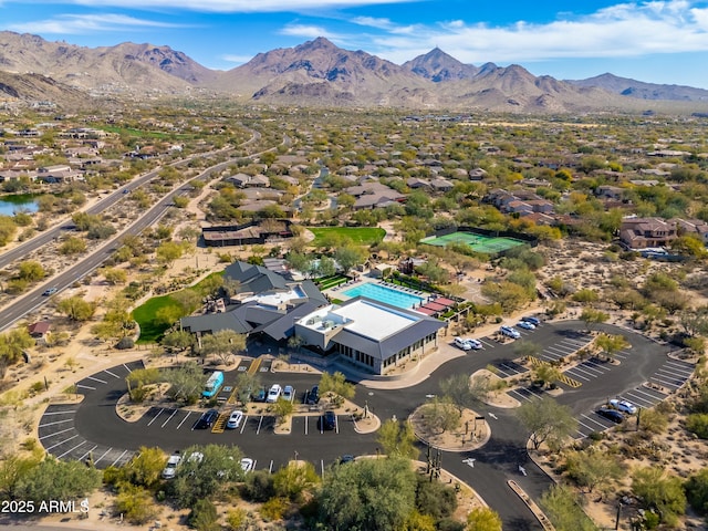 birds eye view of property featuring a mountain view