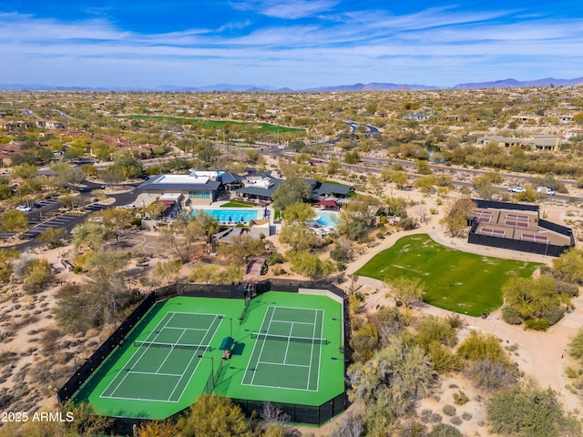 birds eye view of property featuring a mountain view