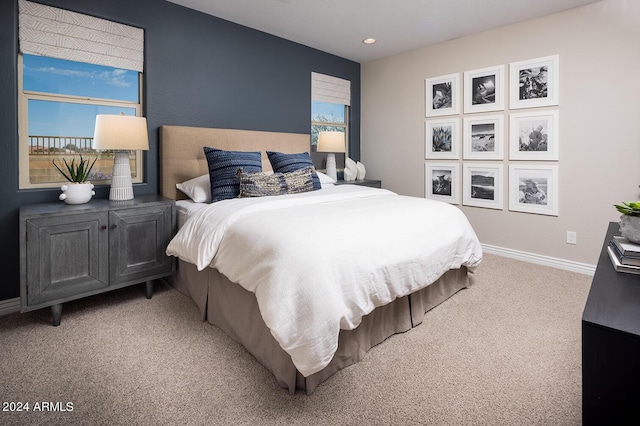 bedroom featuring carpet flooring, recessed lighting, baseboards, and multiple windows