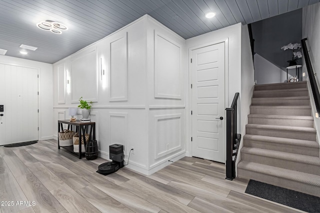 1501 E Rakestraw Ln, Gilbert, AZ 85298 - entryway with light wood-style flooring, stairway, wooden ceiling, recessed lighting, and baseboards