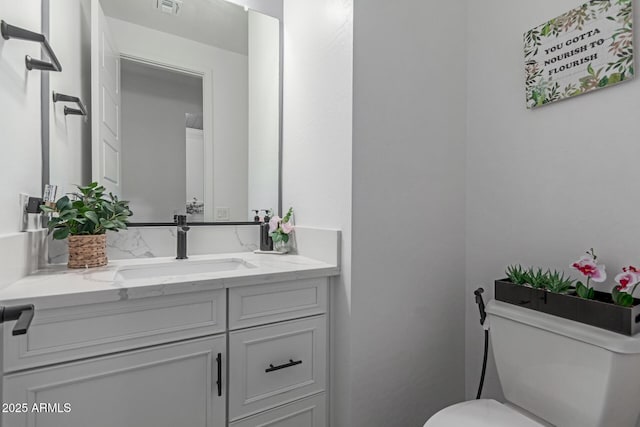 1501 E Rakestraw Ln, Gilbert, AZ 85298 - bathroom with vanity and toilet