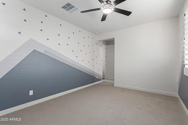 1501 E Rakestraw Ln, Gilbert, AZ 85298 - spare room featuring a ceiling fan, light colored carpet, and baseboards