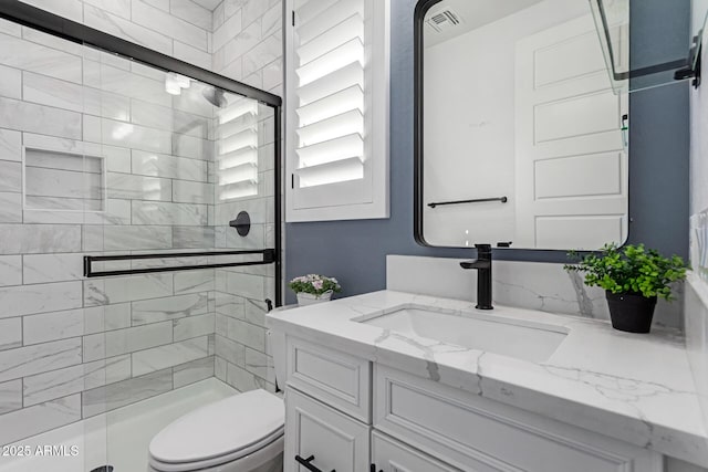1501 E Rakestraw Ln, Gilbert, AZ 85298 - bathroom with vanity, a stall shower, and toilet