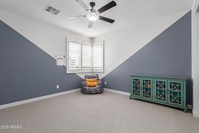 1501 E Rakestraw Ln, Gilbert, AZ 85298 - living area featuring a ceiling fan, carpet flooring, and baseboards