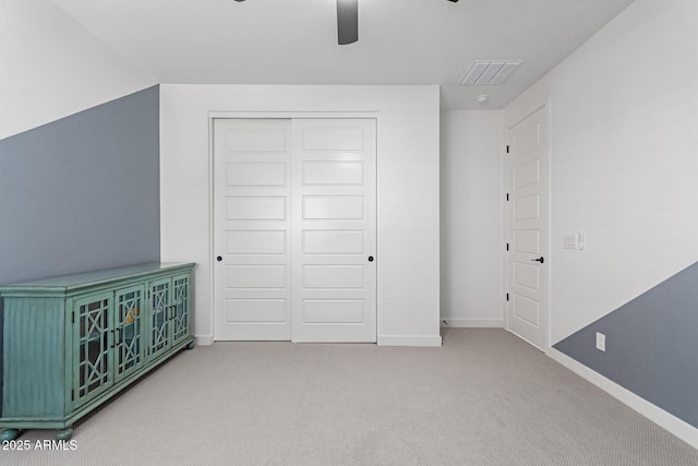 1501 E Rakestraw Ln, Gilbert, AZ 85298 - unfurnished bedroom featuring a closet, carpet floors, baseboards, and a ceiling fan