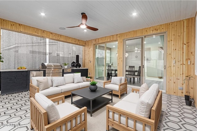 1501 E Rakestraw Ln, Gilbert, AZ 85298 - living area featuring wooden walls and ceiling fan