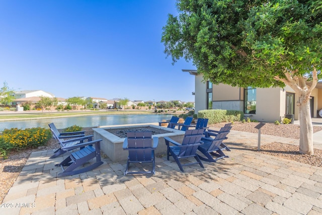 1501 E Rakestraw Ln, Gilbert, AZ 85298 - view of patio / terrace with a water view and an outdoor fire pit