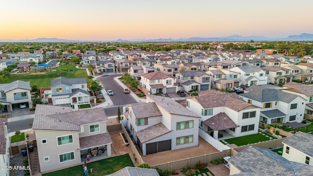 1501 E Rakestraw Ln, Gilbert, AZ 85298 - aerial view at dusk of a residential view and a mountain view