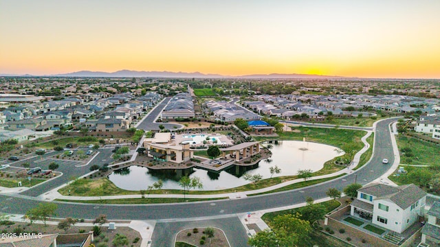 1501 E Rakestraw Ln, Gilbert, AZ 85298 - aerial view at dusk of a water and mountain view and a residential view