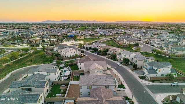 1501 E Rakestraw Ln, Gilbert, AZ 85298 - aerial view at dusk of a mountain view and a residential view