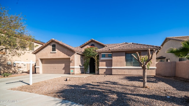 view of front of property with a garage