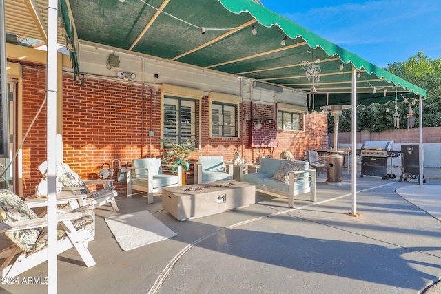 view of patio / terrace featuring an outdoor living space and area for grilling