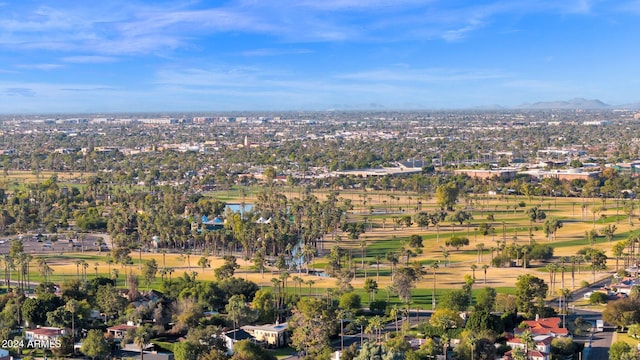 birds eye view of property featuring a mountain view