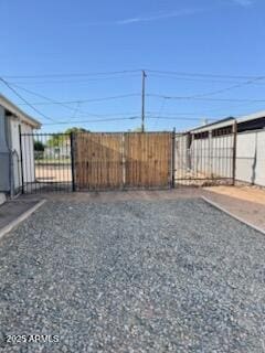 view of yard featuring a gate and fence