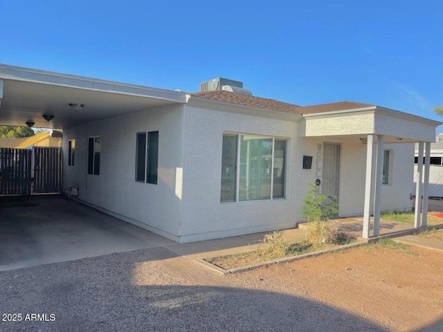 view of front of home with a carport