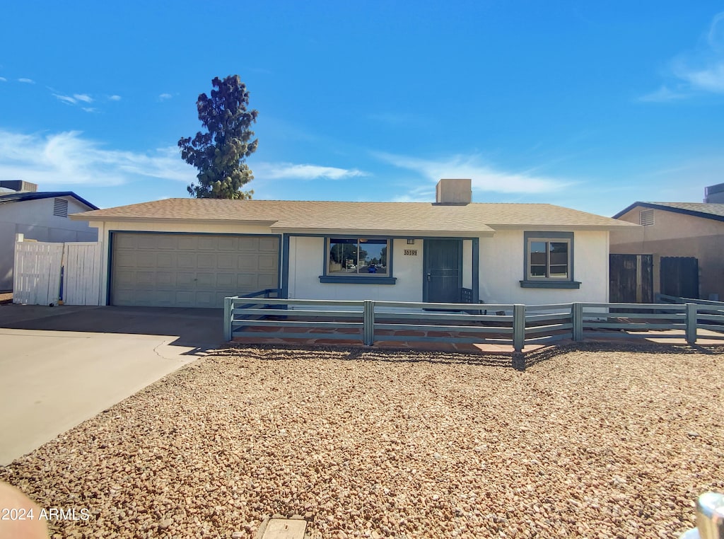 ranch-style house with a garage