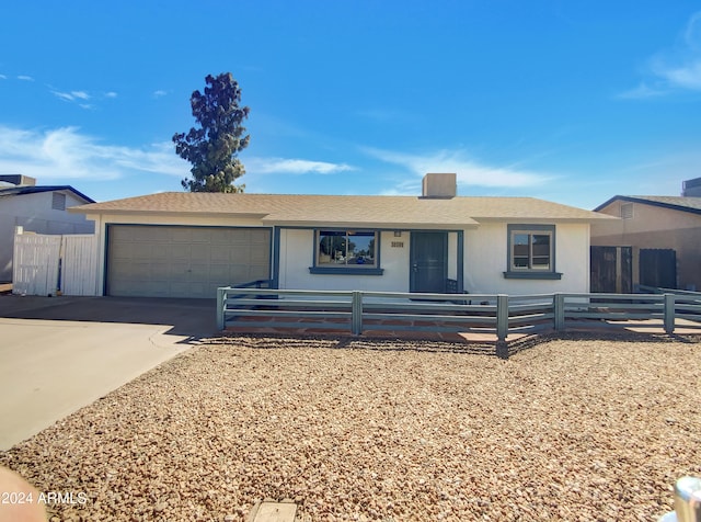 ranch-style house with a garage