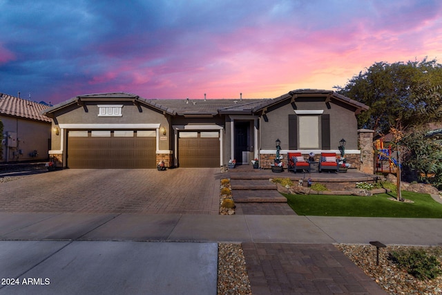 view of front of property with a garage