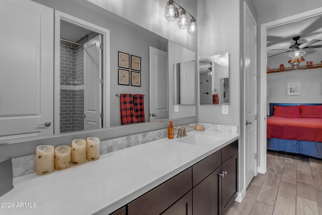 bathroom with vanity and ceiling fan