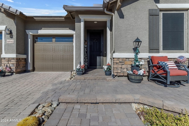 property entrance with a garage