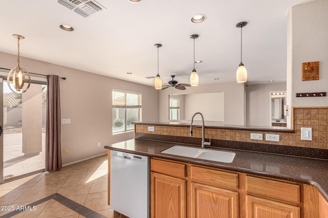 kitchen with visible vents, dishwasher, light tile patterned floors, recessed lighting, and a sink